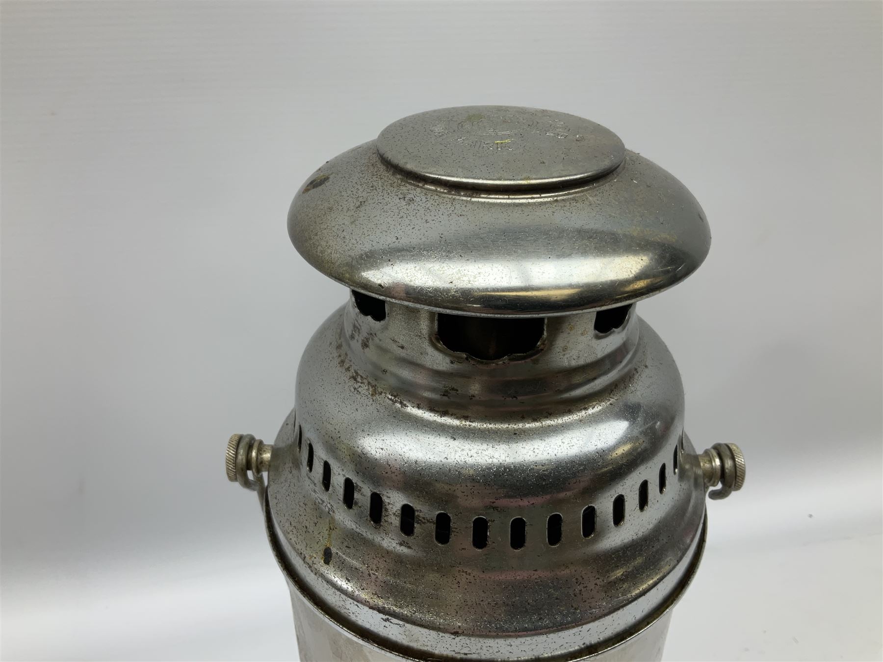 Copper and brass ship’s lamp marked ‘Anchor’, H25cm, Feuer hand storm lantern, Bialaddin Model 315 paraffin lamp and an Anchor lamp (4)