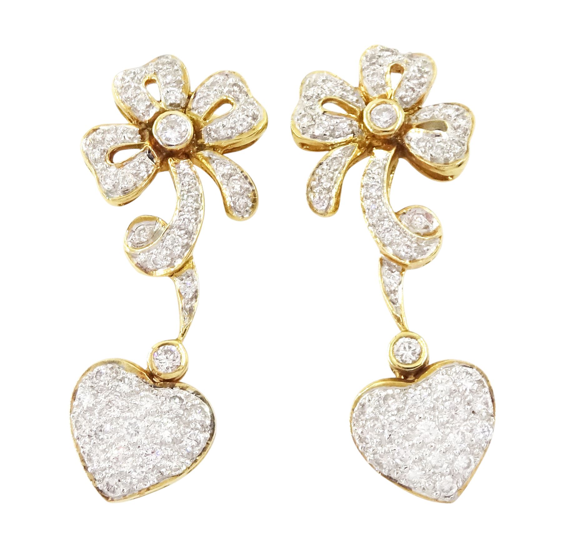 Pair of 18ct gold diamond heart and bow earrings, each stud with a heart shaped pendant, set with round brilliant cut diamonds, suspending from a diamond ribbon and bow motif