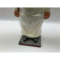 20th century, cast iron doorstop, in the form of a pig dressed in chef whites, H57cm