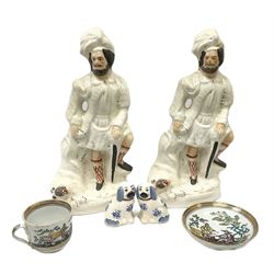 Two Staffordshire pottery flat back figures of the lion slayer, together with pair of staffordshire style dogs and a Victorian cup and saucer 