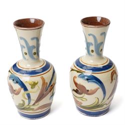 Thomas Forrester & Son Trogon Ware vase, c1920-1930, of baluster form with bulbous neck, painted with a band of peacocks, signed, H21cm; together with a pair of vases designed by James Plant, signed to base, H19cm, a Herman August Kahler (Danish 1846-1917) vase, of elongated form, signed to base, H29cm, and two further vases (6)
