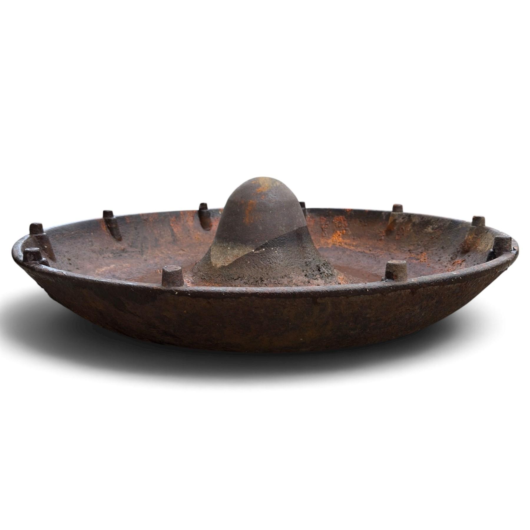 Two early 20th century cast iron ‘Mexican hat’ pig trough planters, each of circular dished form with central domed boss, one fitted with fixing studs for radial feeding divisions