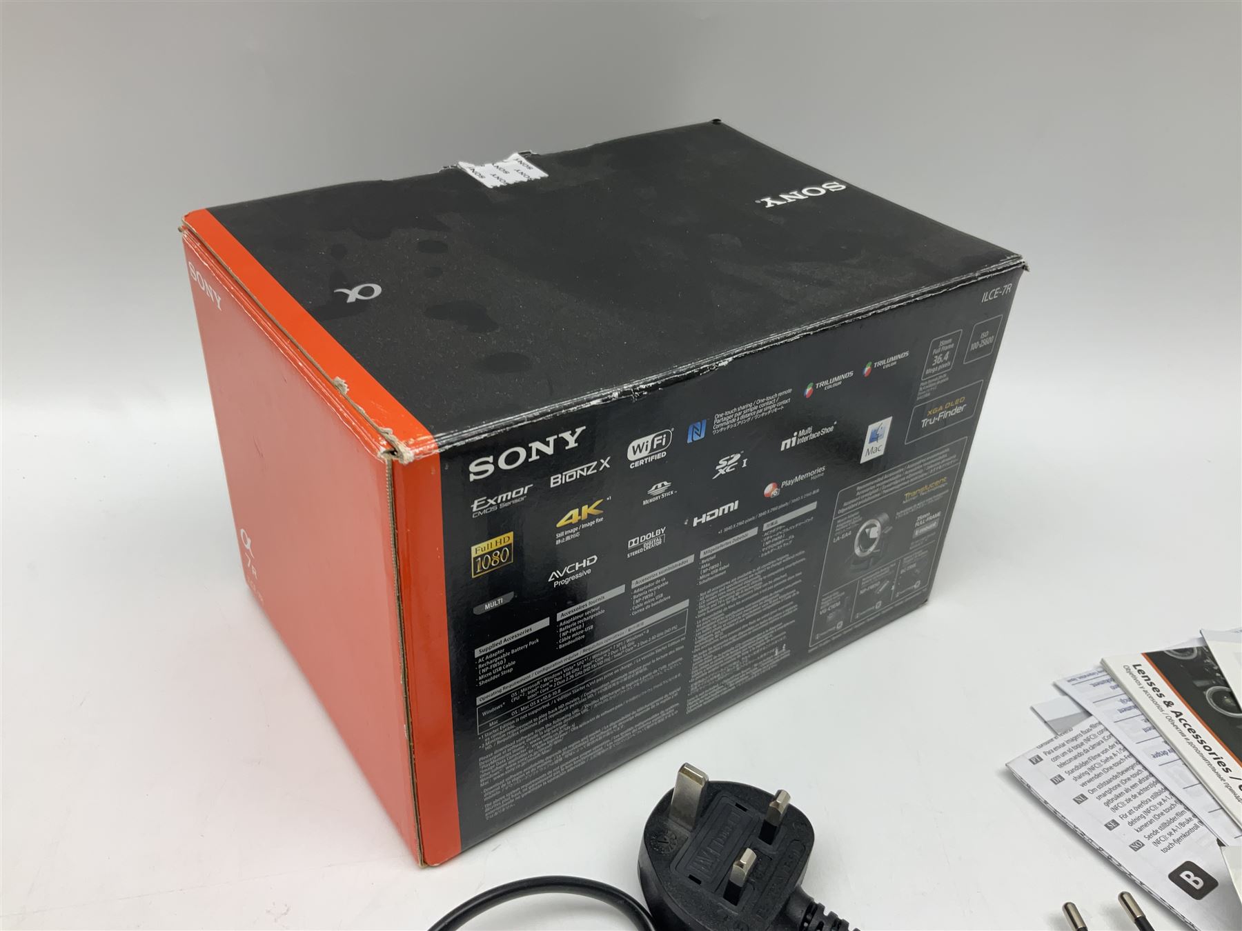 Sony Alpha 7R ILCE-7R camera body, serial no. 3985804, with 'Voigtlander Super Wide-Heliar f/4.5 15mm' lens, serial no. 9250212, camera with charger and in original box