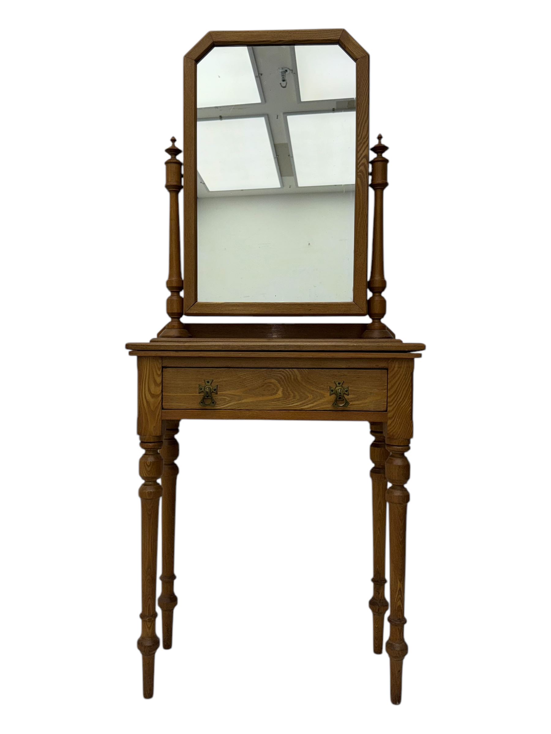 Late 19th century ash dressing table, rectangular mirror supported by two turned columns with carved finials, single drawer with brass handles, raised on turned supports