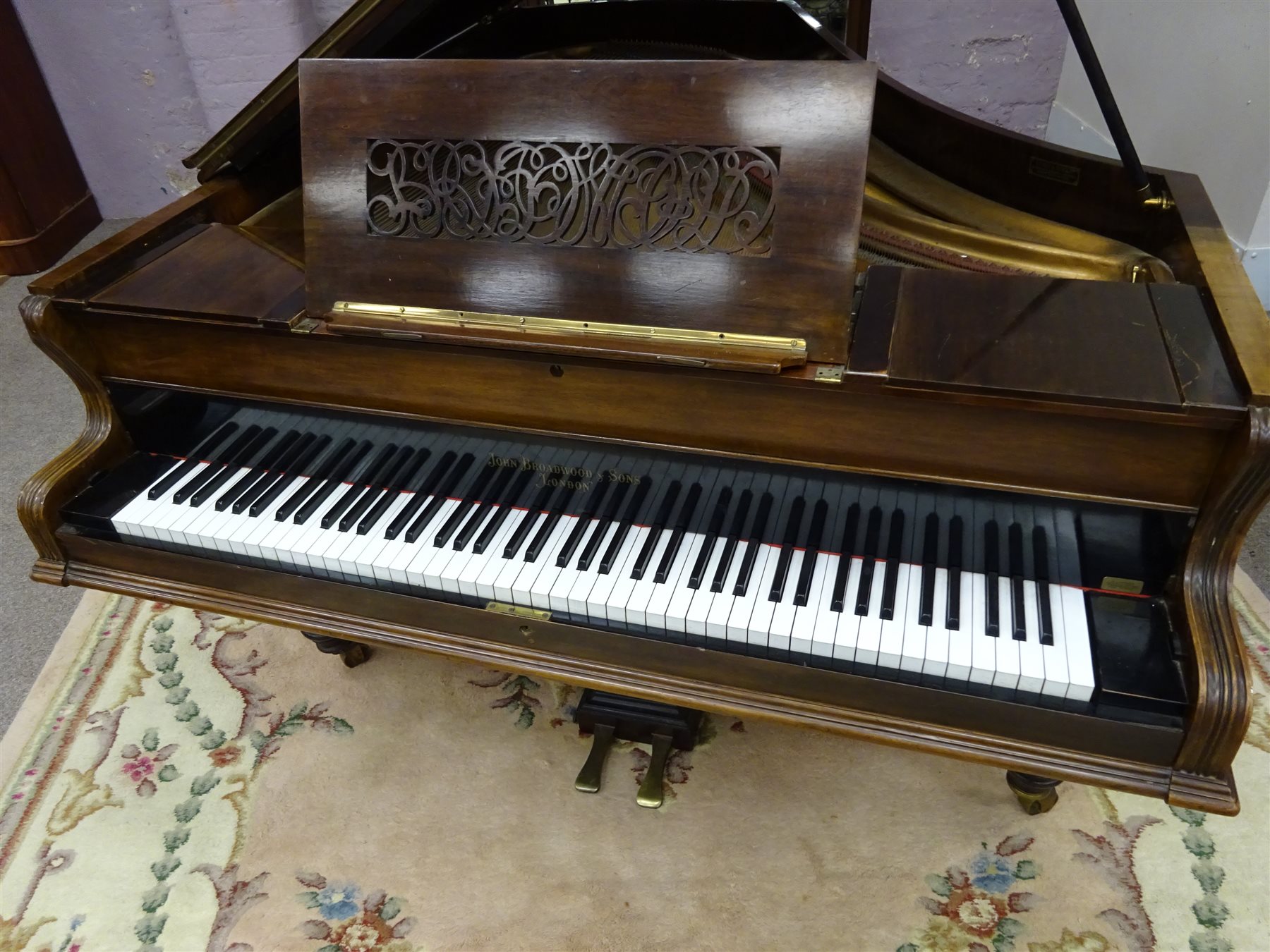Victorian mahogany cased grand piano, cast iron overstrung, turned