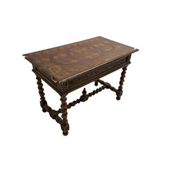 Early 20th century carved oak side table, the rectangular top with cross section inlay, frieze carved with foliate decoration, raised on spiral turned supports united by barley-twist stretcher with finial