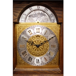  Emperor three chime light oak longcase clock, triple weight movement chiming the quarter hours on rods, swan necked pediment and glazed door, with instructions, H215cm  
