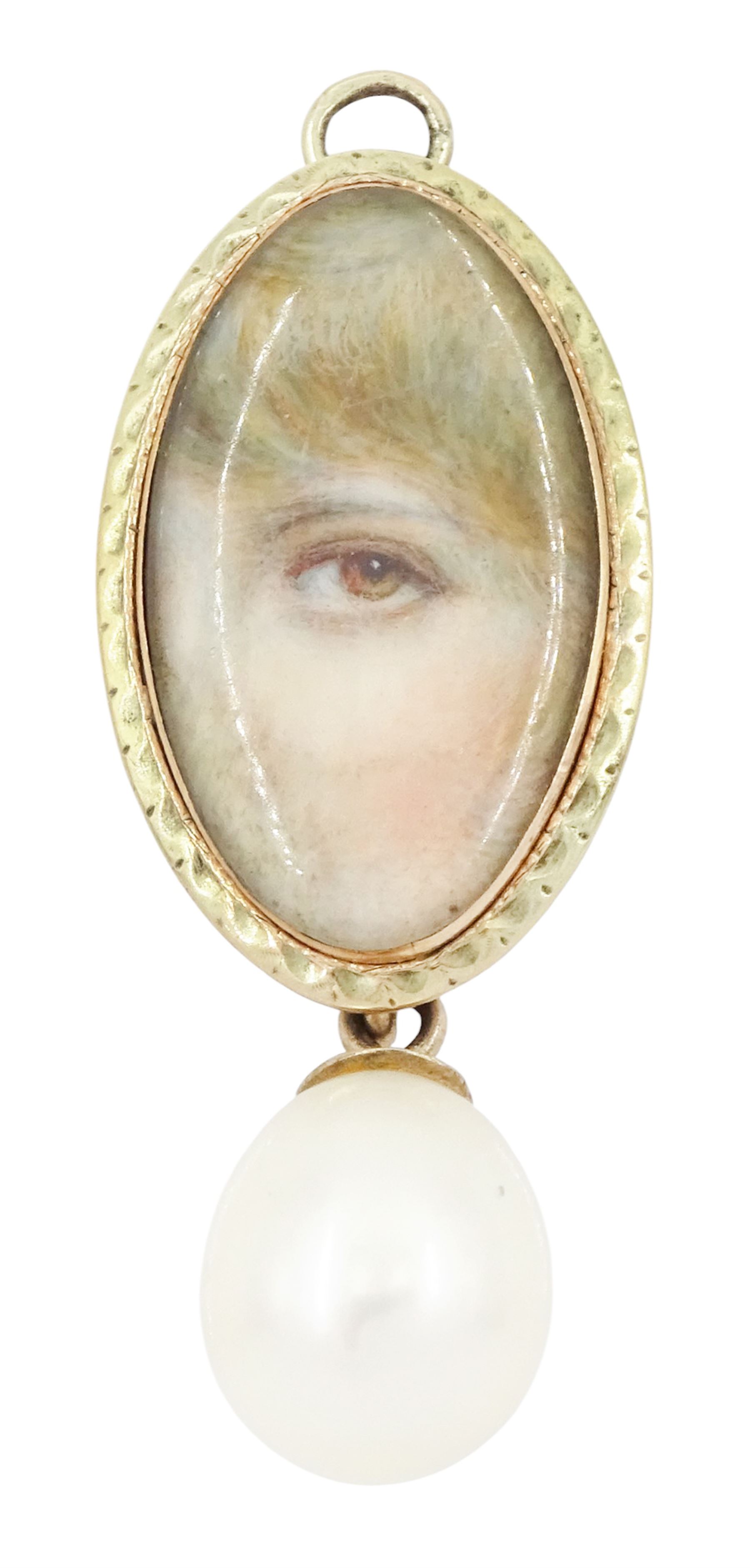 Georgian gold 'Lover's Eye' pendant, set with a lozenge shaped portrait miniature of a lady's eye on ivory, within a milled bezel and closed back, suspending a later cultured pearl drop. This lot has been registered for sale under Section 10 of the APHA Ivory Act