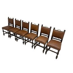 Set six early early 20th century oak dining chairs, cresting rail with pair carved lion mask mounts, back and sprung seat upholstered in tan leather, raised on turned supports united by stretchers