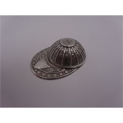 Edwardian silver caddy spoon, in the form of a jockeys cap, with embossed decoration and blank shield shaped cartouche, hallmarked Thomas Bradbury & Sons Ltd, Sheffield 1909, L5.3cm