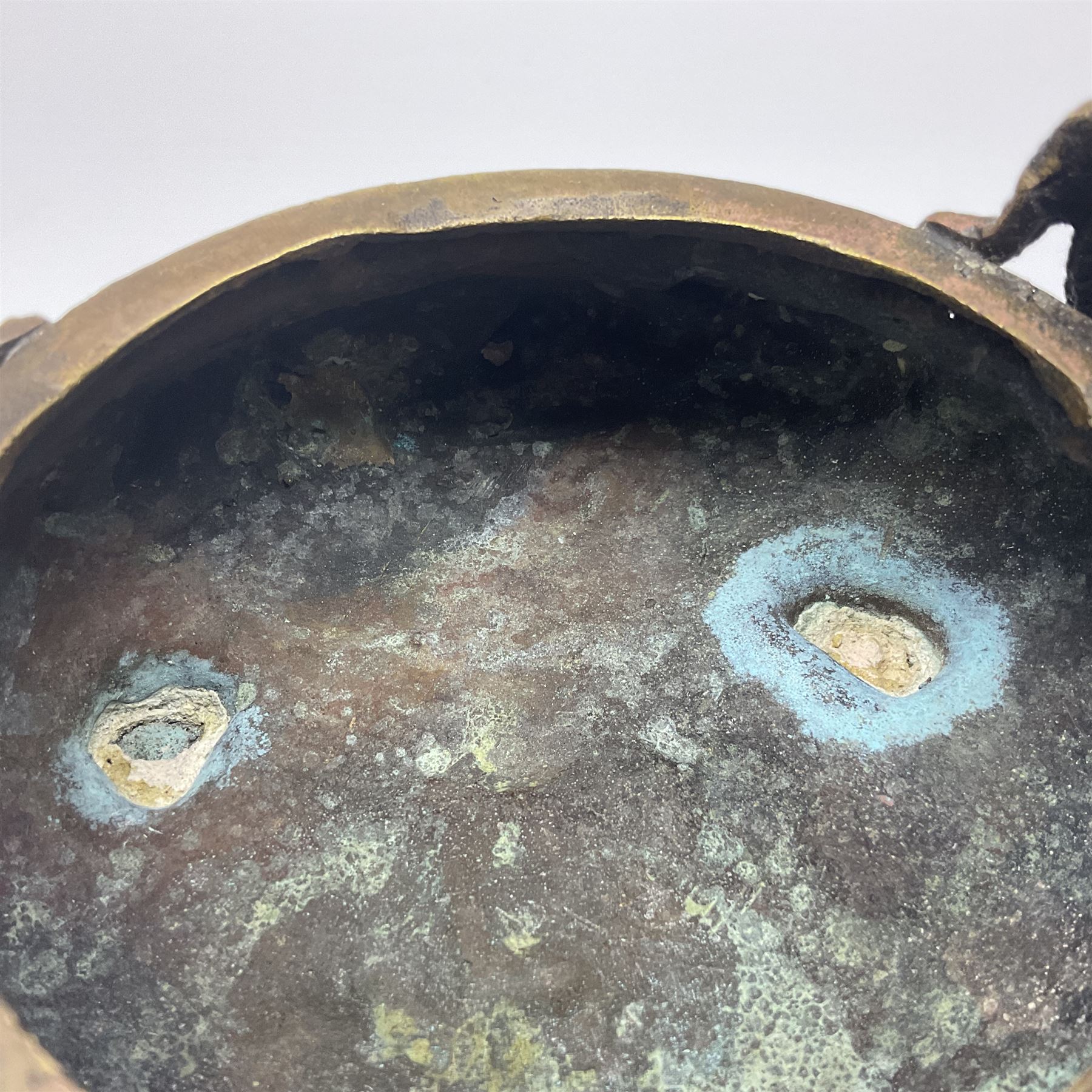 Chinese cast brass censer, with applied dragon twin handles and decoration, raised upon three feet with character mark beneath, D12cm H9.5cm