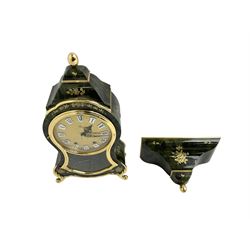 Eluxa - two train 8-day  20th century bracket clock in a faux green tortoiseshell case, with decorative brass work and a fully glazed door to the dial and front of the case, visible pendulum, brass dial with cartouche roman numerals, Swiss movement striking the hours and half hours. With support bracket, pendulum and key.
