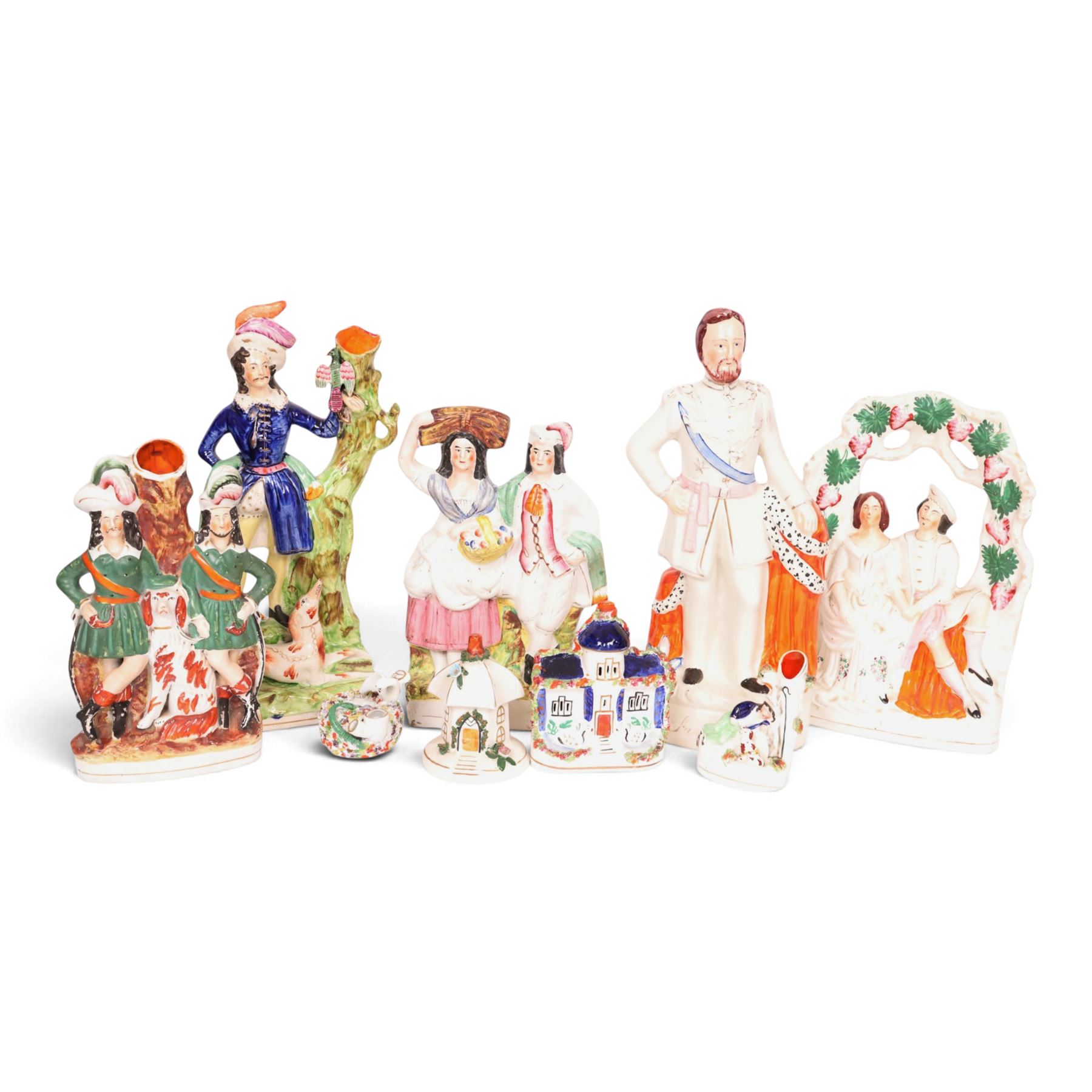 Collection of Staffordshire figures, including Prince of Wales, spill vases, courting couples etc, largest H43cm 