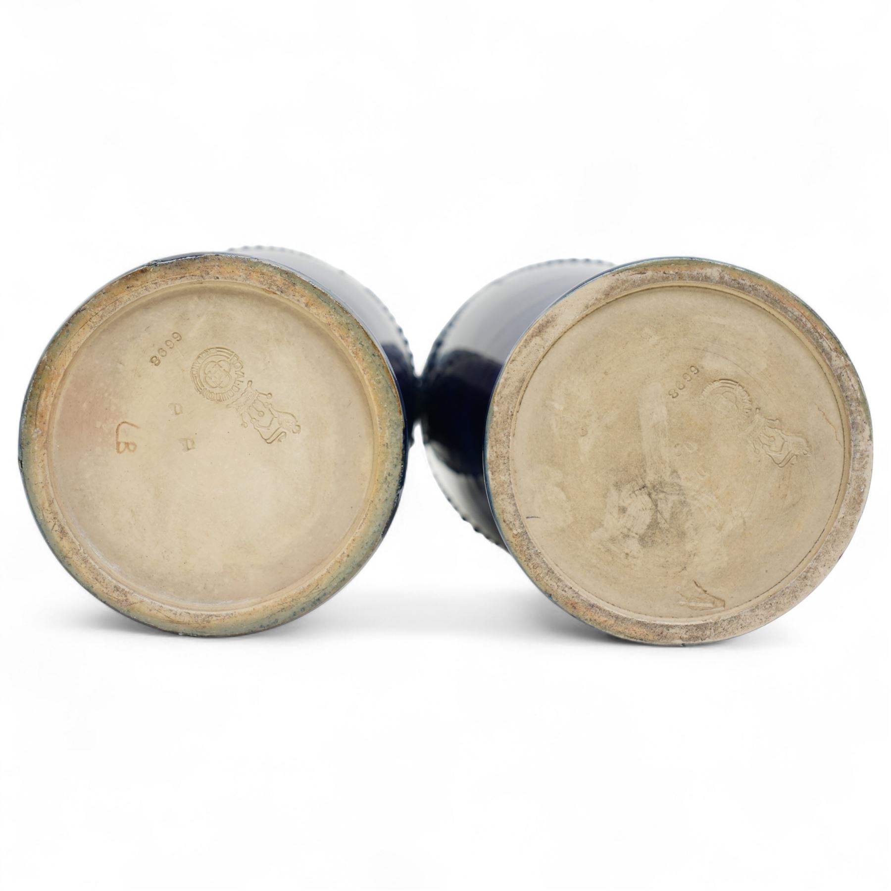 Pair of Royal Doulton stoneware vases, of baluster form, each with raised swag decoration, impressed marks to base with incised initials 'LB', numbered 6698, H29cm