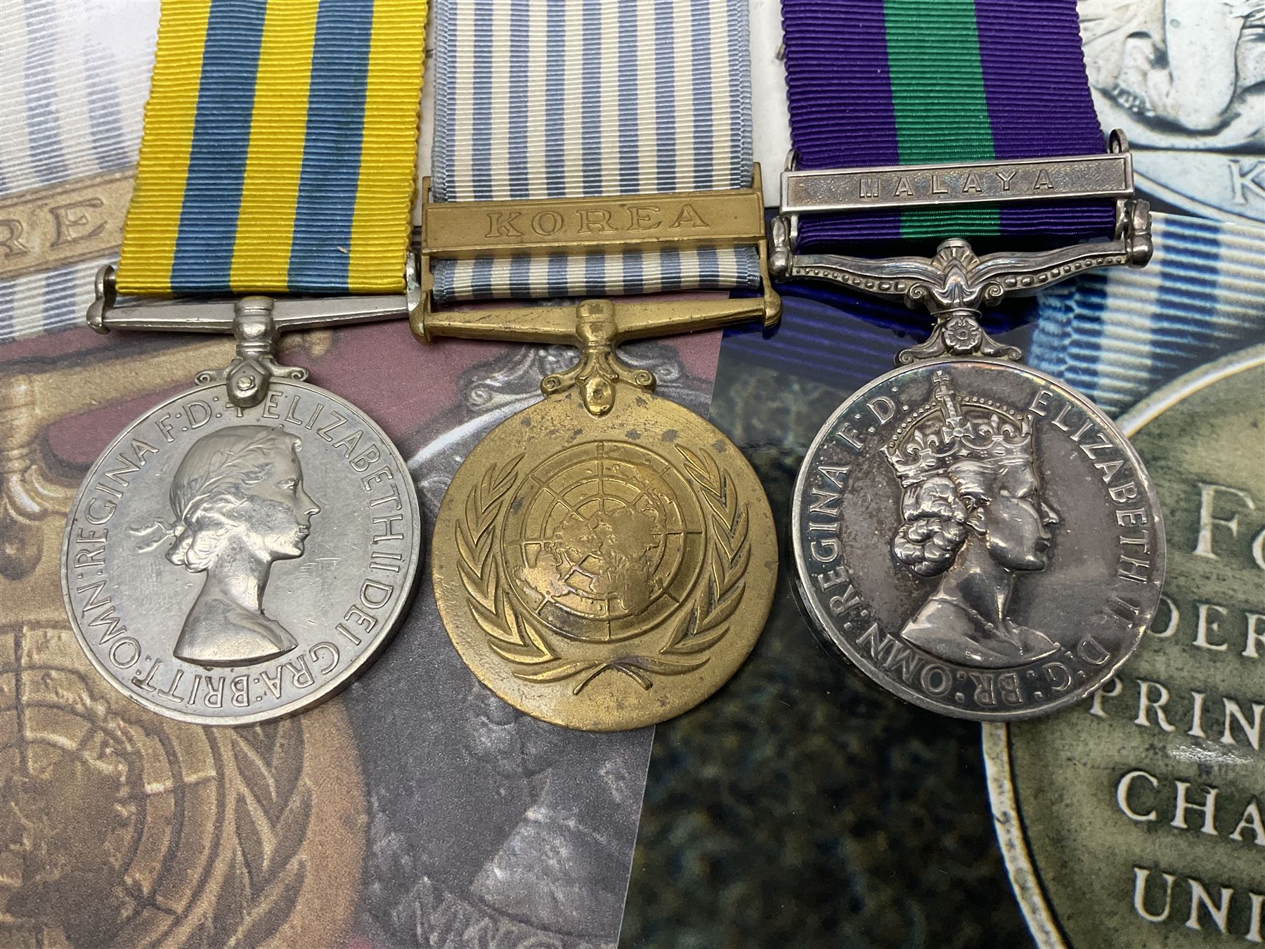 Korean War group of three medals comprising ERII Korea Medal awarded to 22307852 Pte. M. McGill R.A.M.C., UN Korea Medal and ERII General Service Medal with Malaya clasp to 22307852 Cpl. M. McGill R.A.M.C.