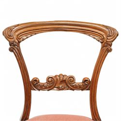 A pair of Victorian walnut balloon back parlours chairs, with carved top rail and back splat with cabriole style legs, Together with a pair Victorian mahogany balloon dining chairs