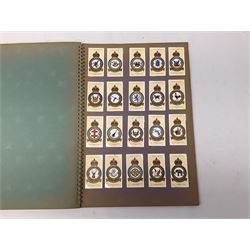 Magnus Laurie: The West Riding Territorials in the Great War. 1920: German Haus Neuerburg cigarette card album entitled Der Bunte Rock depicting 19th century military uniforms; French Chocolat Aiglon trade card album including some military costumes; and a cigarette card album, some of military interest (4)