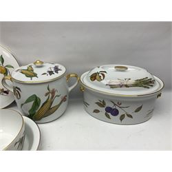 Royal Worcester Evesham pattern, including covered pot de cremes, twin handle tureen, serving dishes, flan dishes, side plates etc  