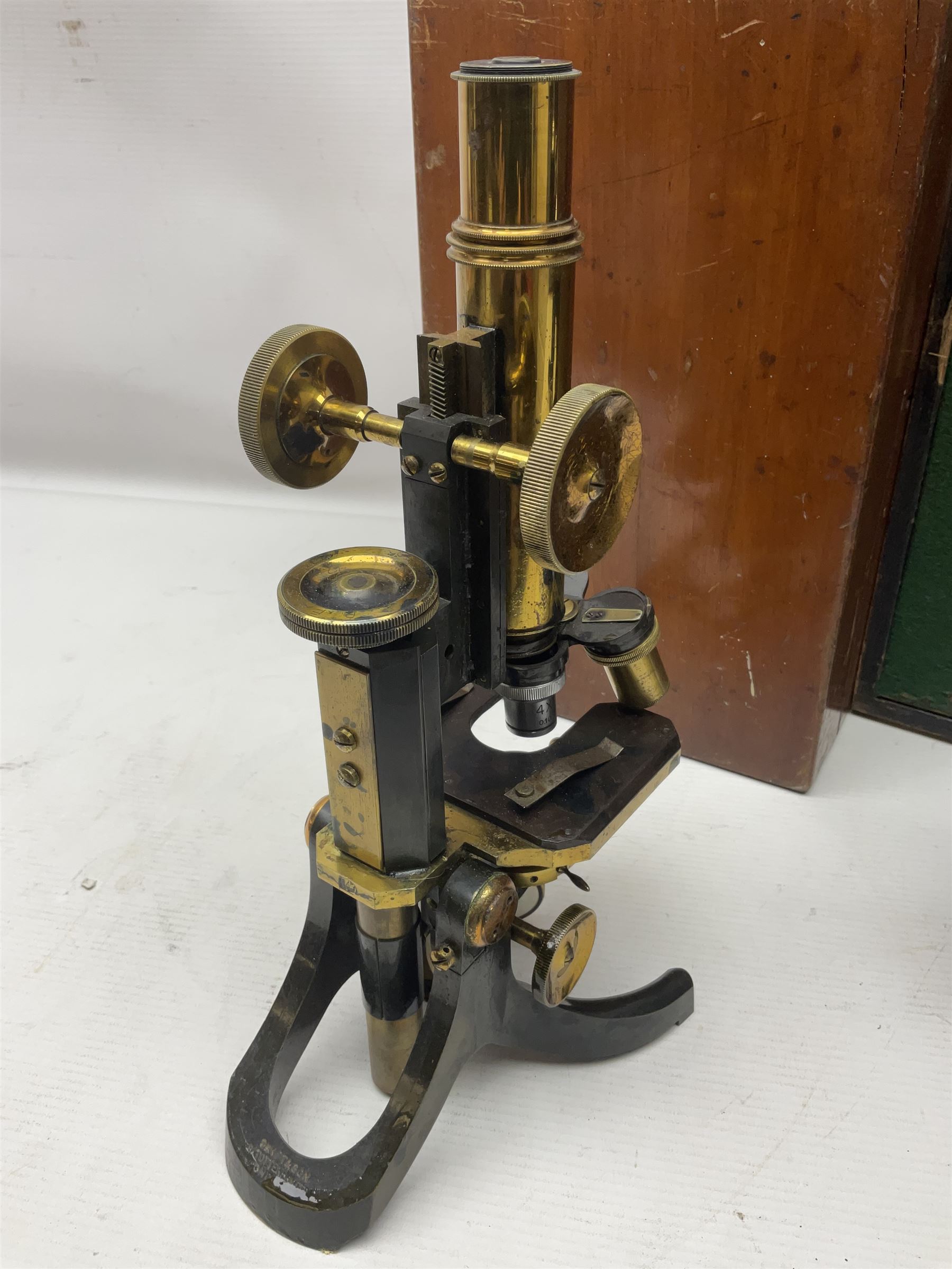 Three microscopes, comprising Swift and Son, Beck model 22 no 5512 amd E. Leitz Wetzlar no 113555, all boxed