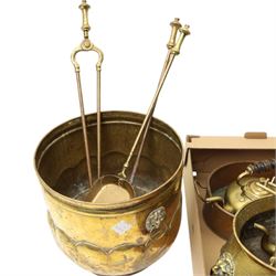 Collection of brassware, including fireside accessories, coal bucket, kettle and stand, two candlesticks, etc