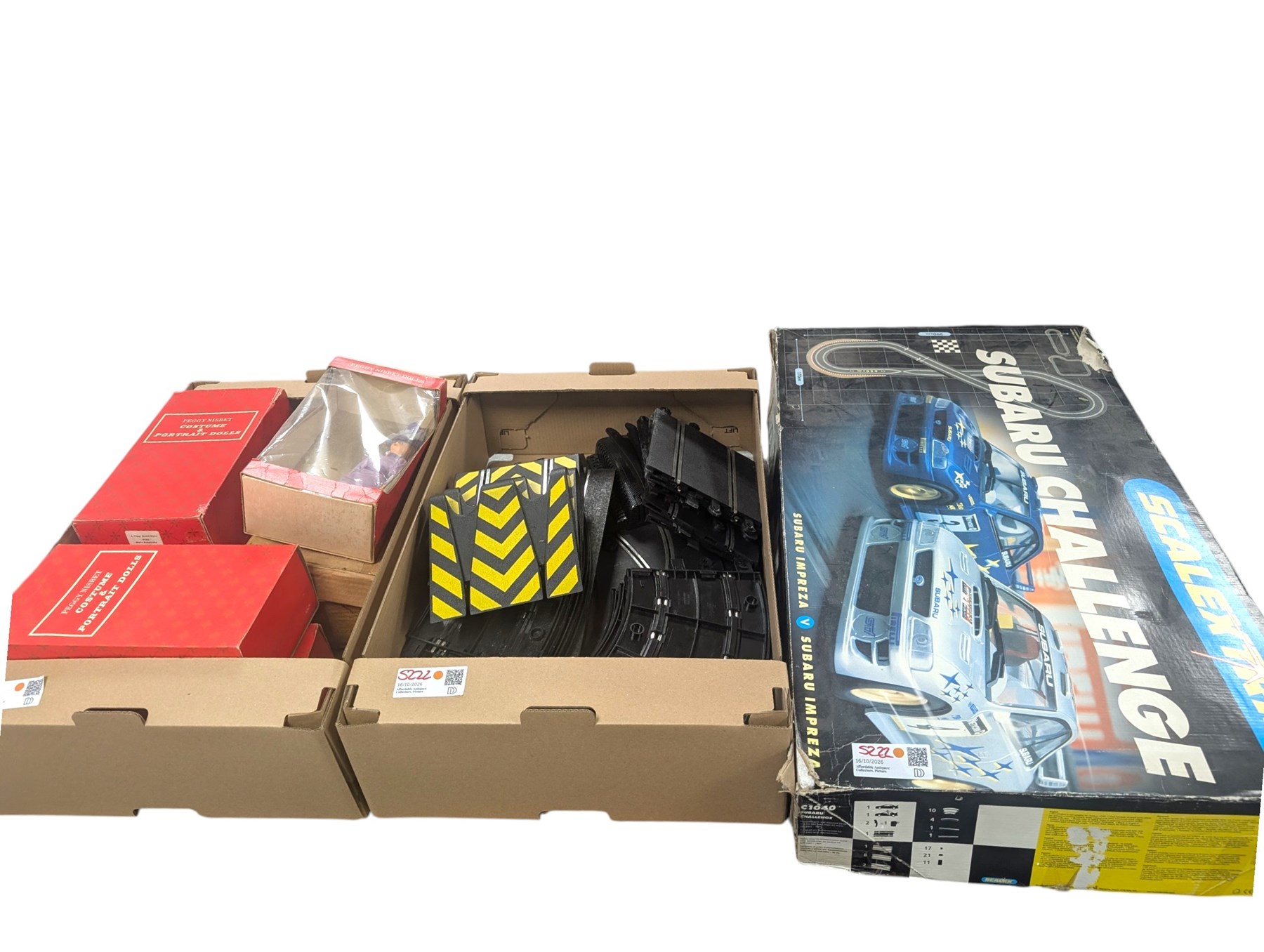 Scalextric Subaru Challenge set, boxed, collection of Scalextric track, building bricks, five Peggy Nesbit costume dolls