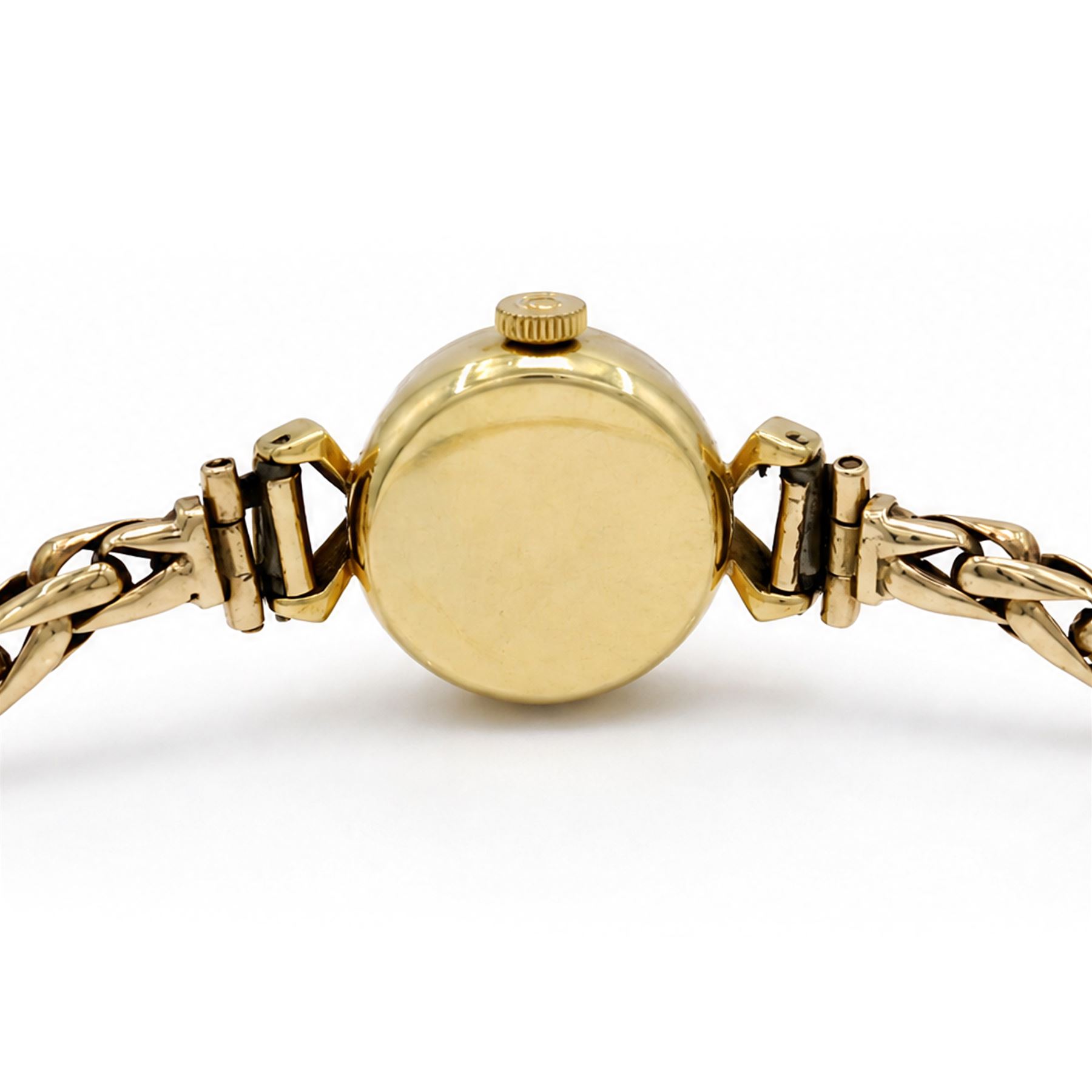 Omega ladies 18ct gold manual wind wristwatch, Cal. 483, gilt dial with diamond and dot hour markers, Helvetia hallmark, on 9ct gold bracelet, with fold-over clasp, Birmingham 1959
