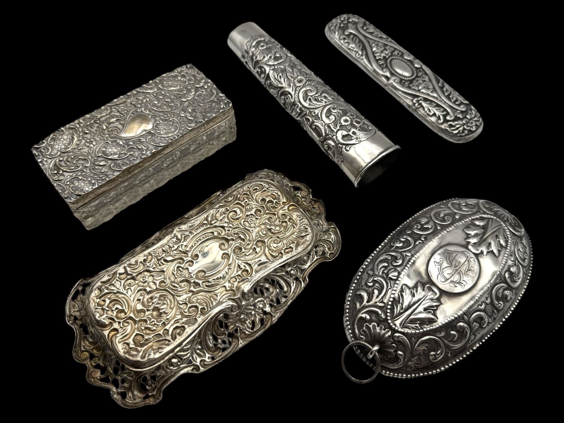Group of silver, including glass jar with silver lid, pierced pin tray, vase sleeve and two silver lids, all hallmarked 