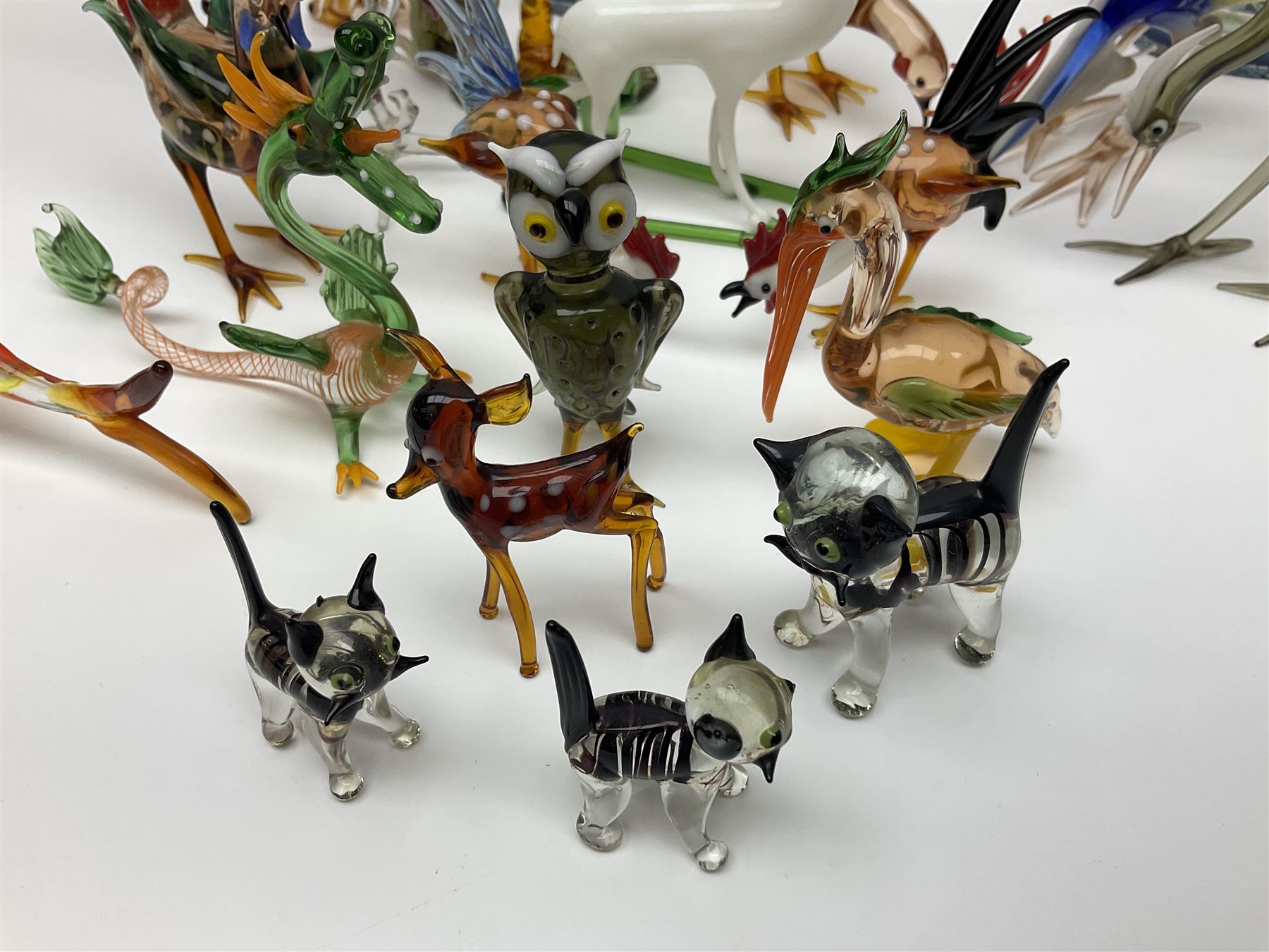 Large collection of hand-blown glass animals and figures, to include fish, birds, cats, dogs, monkeys etc