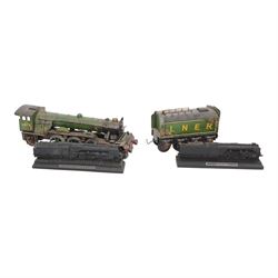Tin plate model of The Flying Scotsman, together with two smaller static locomotive models...