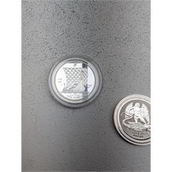 Three Queen Elizabeth II Isle of Man one ounce fine silver coins, comprising 2016, 2018 one angels and 2018 one noble 