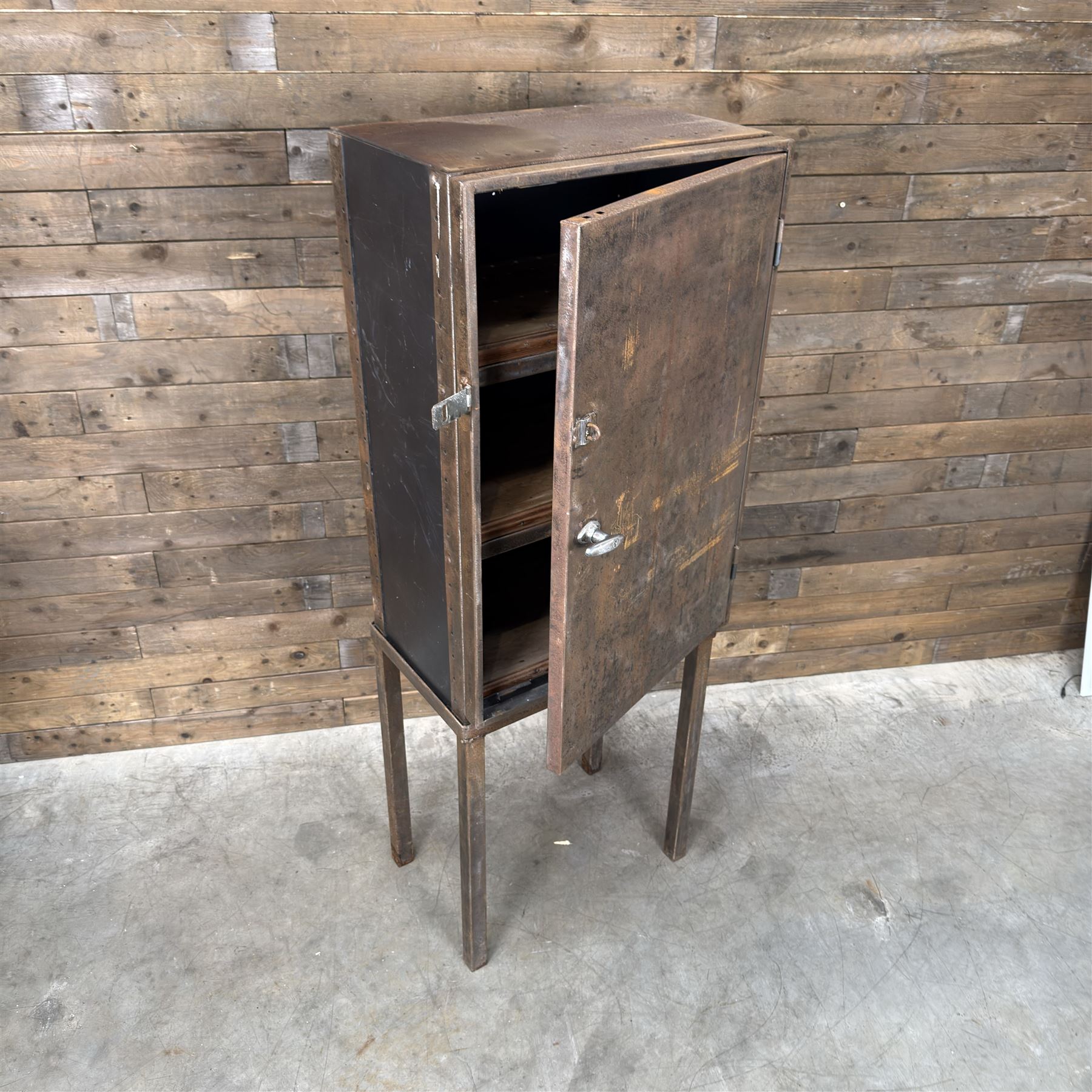 Luxor - industrial modular cabinet, three sections comprising single drawer, double drawer and single cupboard, raised on stand; and a tall industrial cabinet