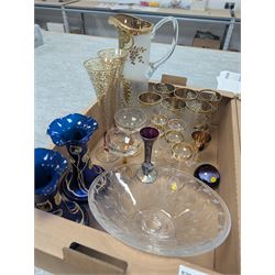 Collection of assorted glassware, to include Czech hand painted lemonade set, with tall jug and six glasses, pair of Art Nouveau blue glass vases painted in gilt with foliate tendrils, John Walsh style bowl with cut leaves decoration, various Edwardian drinking glasses with cut and etched decoration, etc., in two boxes