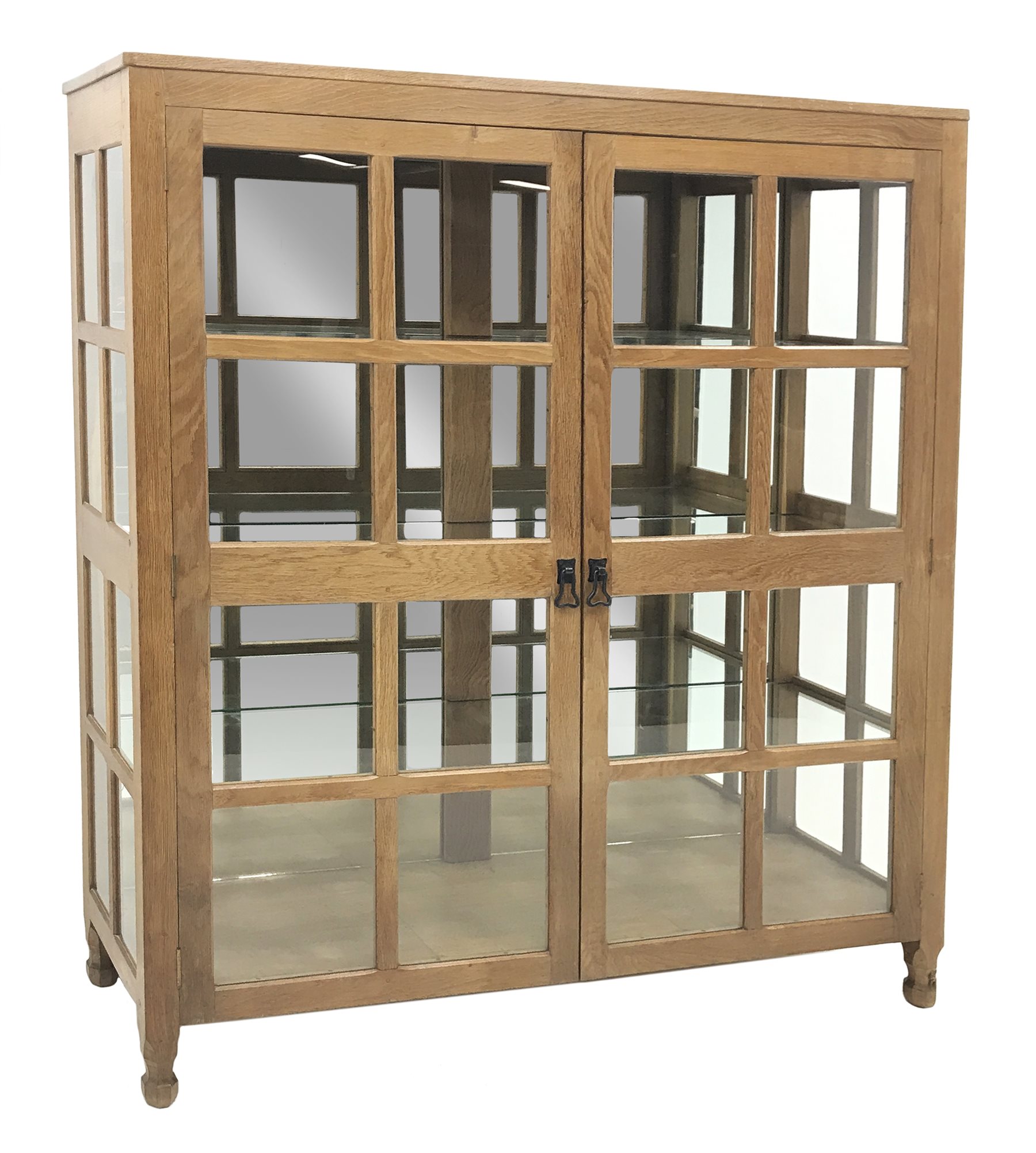 'Foxman' large oak and glazed display cabinet, two doors enclosing three glass shelves and mirrored back, by Don Craven of Oldstead, Thirsk, W154cm, H169cm, D47cm
