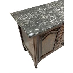 Late 19th century walnut washstand, black and white veined marble top over cupboard and three drawers, turned supports with castors