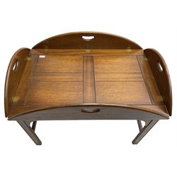 Mahogany butler's tray top coffee table, the removable tray with hinged sides and ends pierced with handles, on square moulded supports united by H stretcher 