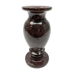 Red marble vase, of baluster form upon a stepped foot, H20cm 