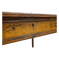 Late Victorian walnut writing table, rectangular leather-inset top surmounted by a brass gallery, fitted with a single frieze drawer, raised on turned tapering supports with lower undertier and ceramic castors