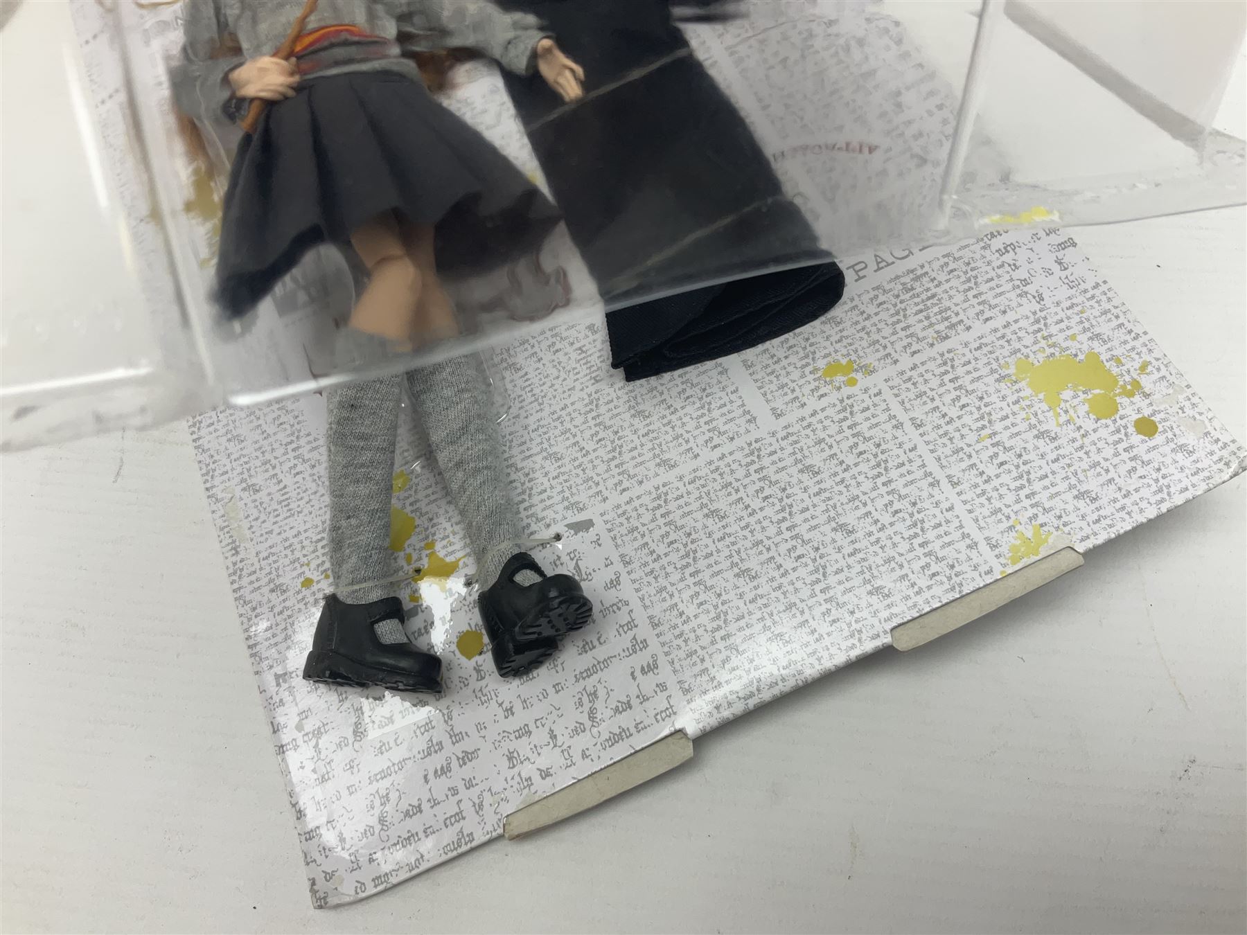 Three Mattel carded Harry Potter dolls - Harry, Hermione & Dumbledore; Vivid Imaginations Take That Robbie doll; all boxed; three Manchester United figures of players (one boxed); and The Simpsons 3-D Chess Game; boxed