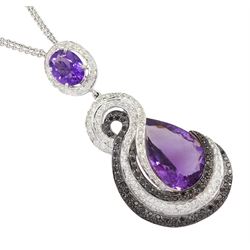 18ct white gold amethyst and diamond pendant necklace, pear cut amethyst with round brilliant cut black and white diamond swirl surround, suspended by an oval and diamond cluster, on an 18ct white gold double chain necklace, with a pair of matching 18ct white gold pendant stud earrings