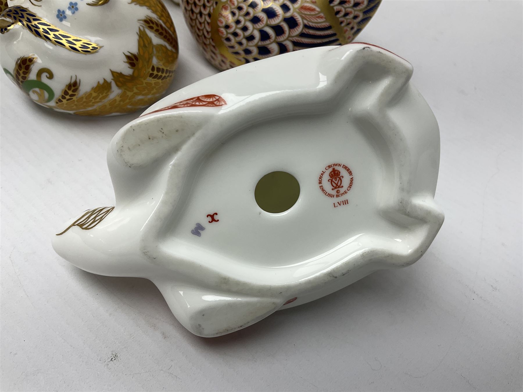 Seven Royal Crown Derby Paperweights, to include Field mouse with silver stopper, Dormouse, Chicken etc,  six without stoppers   