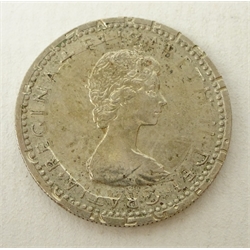 Coin - round coin which appears to be a sixpence but has a print on top of a 1982 twenty pence coin - this is possibly an error coin or just a fantasy coin, there is no supporting documentation, approximate weight 2.85 grams  