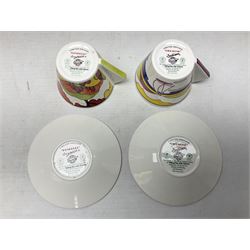 Wedgwood limited edition Clarice Cliff Design Taking Tea collection, comprising eight cups and saucers Honolulu, Apples, Gibraltar, Lilac Crocus, Trees and House, Coral Firs, Devon, and Sunray, with certificates of authenticity 