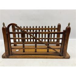 Early 20th century novelty letter rack modelled as a gate and picket fence, with brass post finials, on pine base, L43cm