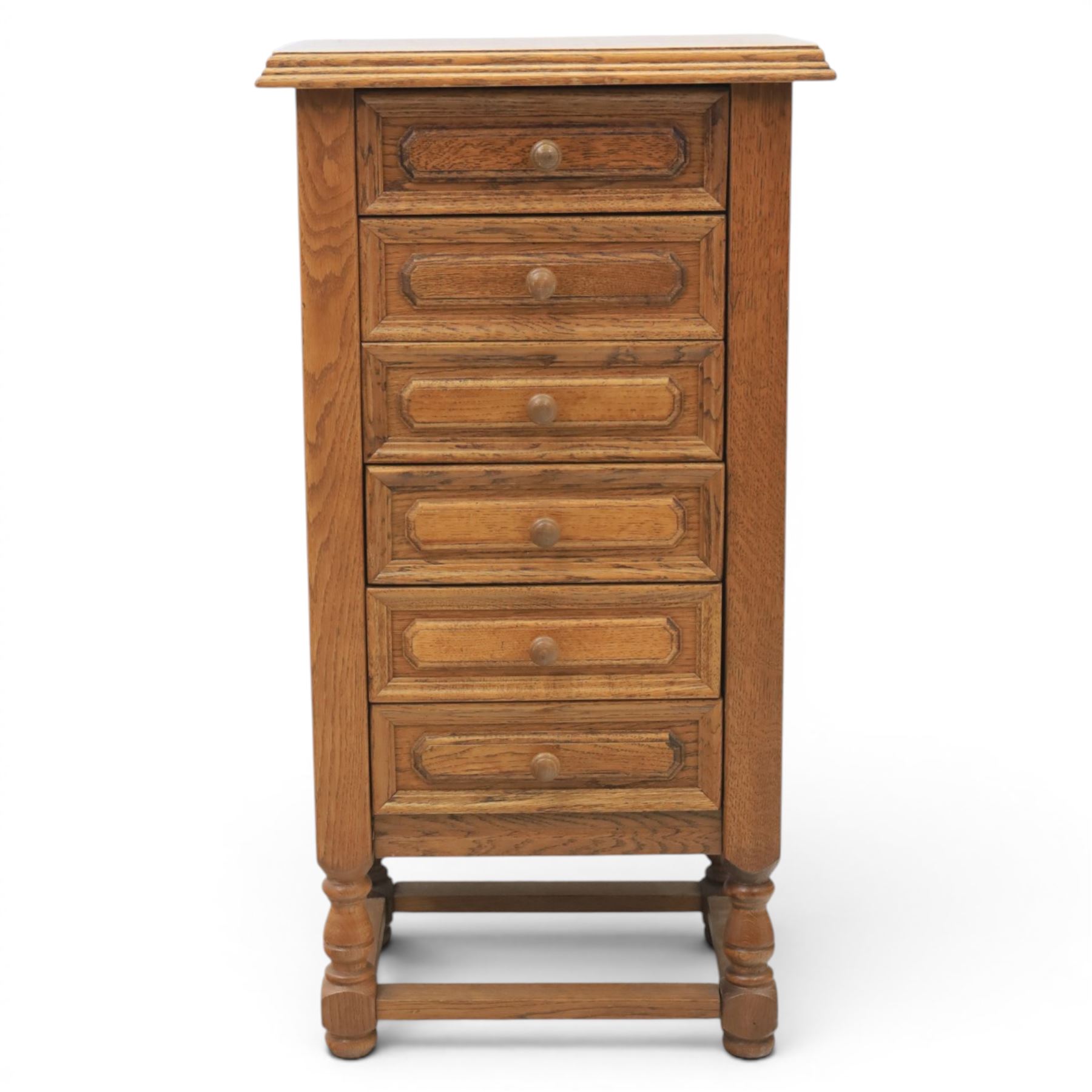 Early 20th century oak pedestal chest, with six drawers with moulded edges, raised on turned supports united by a stretcher 