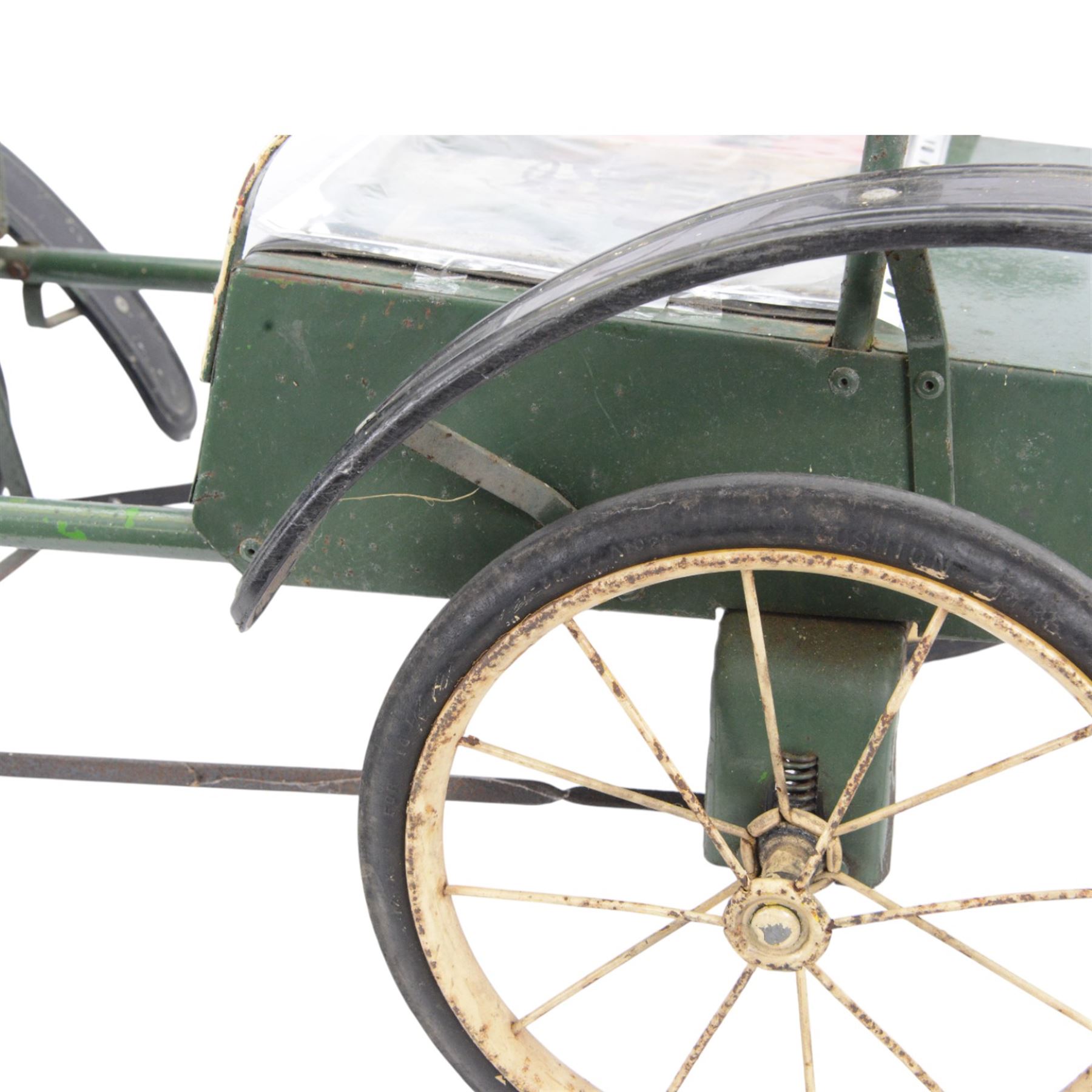 Triang child's pedal car in the style of a vintage automotive, likely a De Dion Bouton or an early Renault, painted in dark green with pale yellow details, H52cm