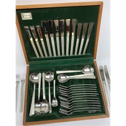 A canteen of bark effect stainless steel cutlery by Gerald Benney for Viners Studio, in a teak case. 