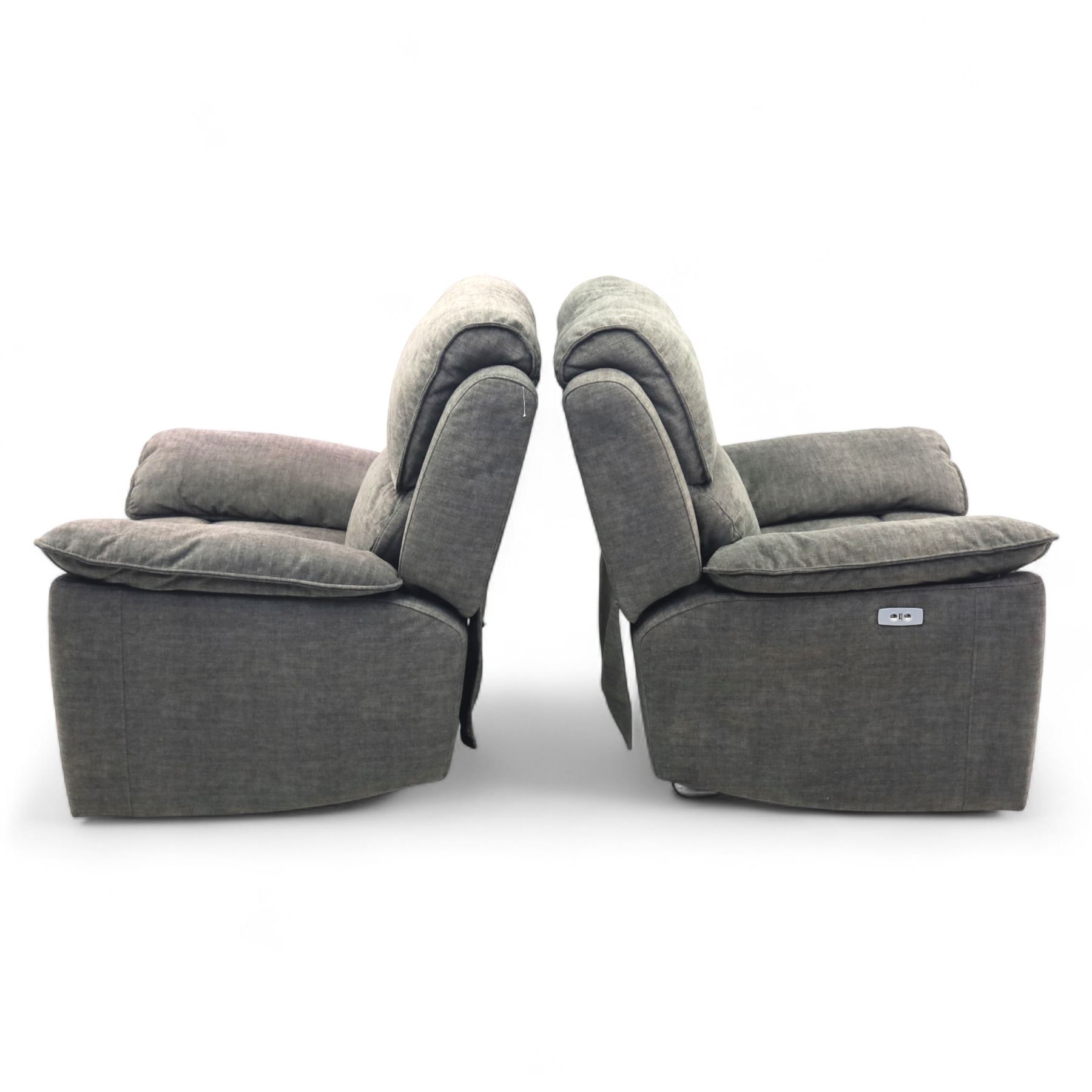 Oak Furnitureland - charcoal fabric electric recliner suite, comprising three-seat sofa and two matching armchairs, each with power reclining mechanism and integrated USB-A charging socket, upholstered in soft charcoal grey fabric with pillow arms and split back cushions

Armchairs W 100, D 82, H 104cm
Sofa W 230cm, D 82cm, H 104cm