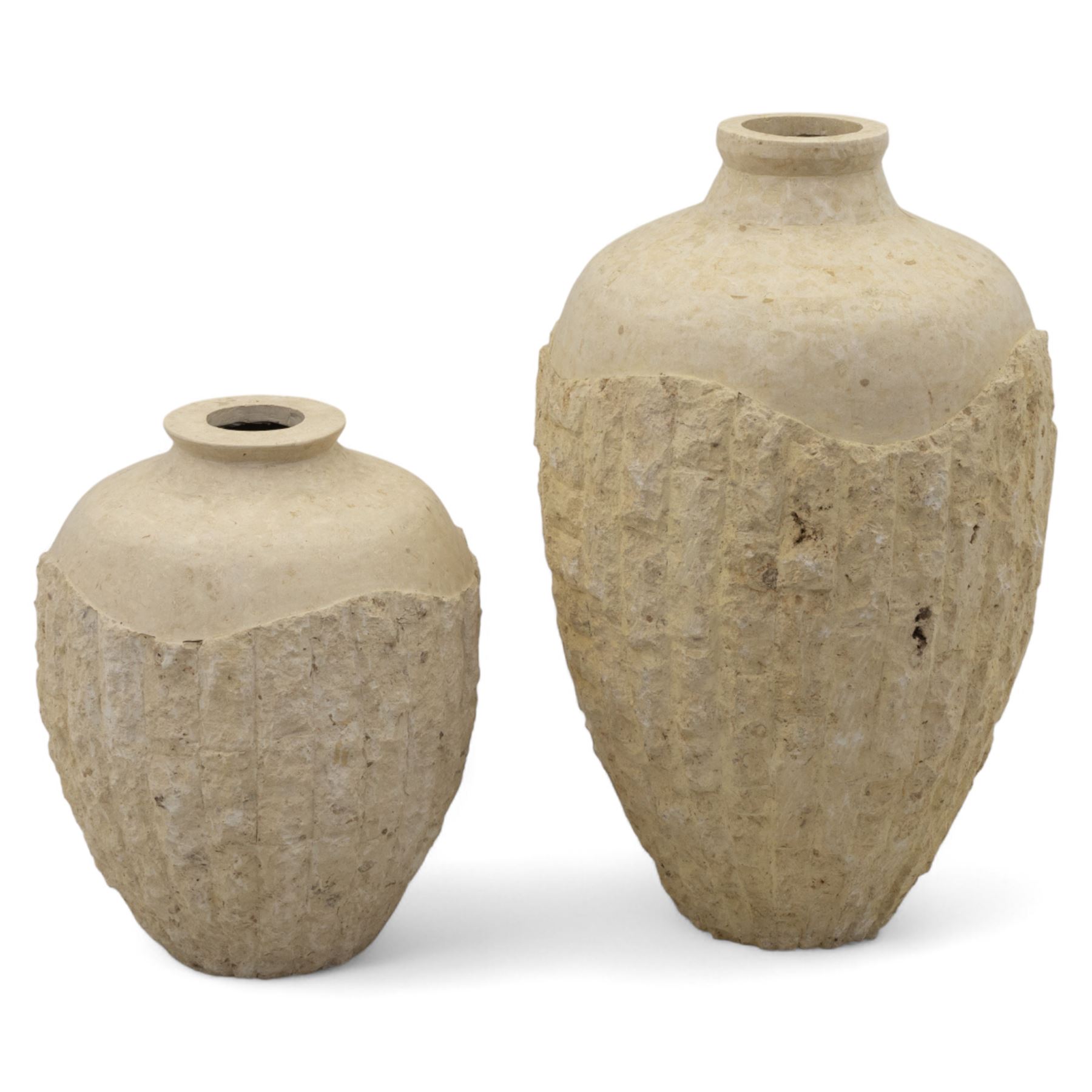Two Mactan composite stone vases, of rounded tapering form with textured lower bodies and smooth necks

(Smaller vase H 64cm, W 45cm)