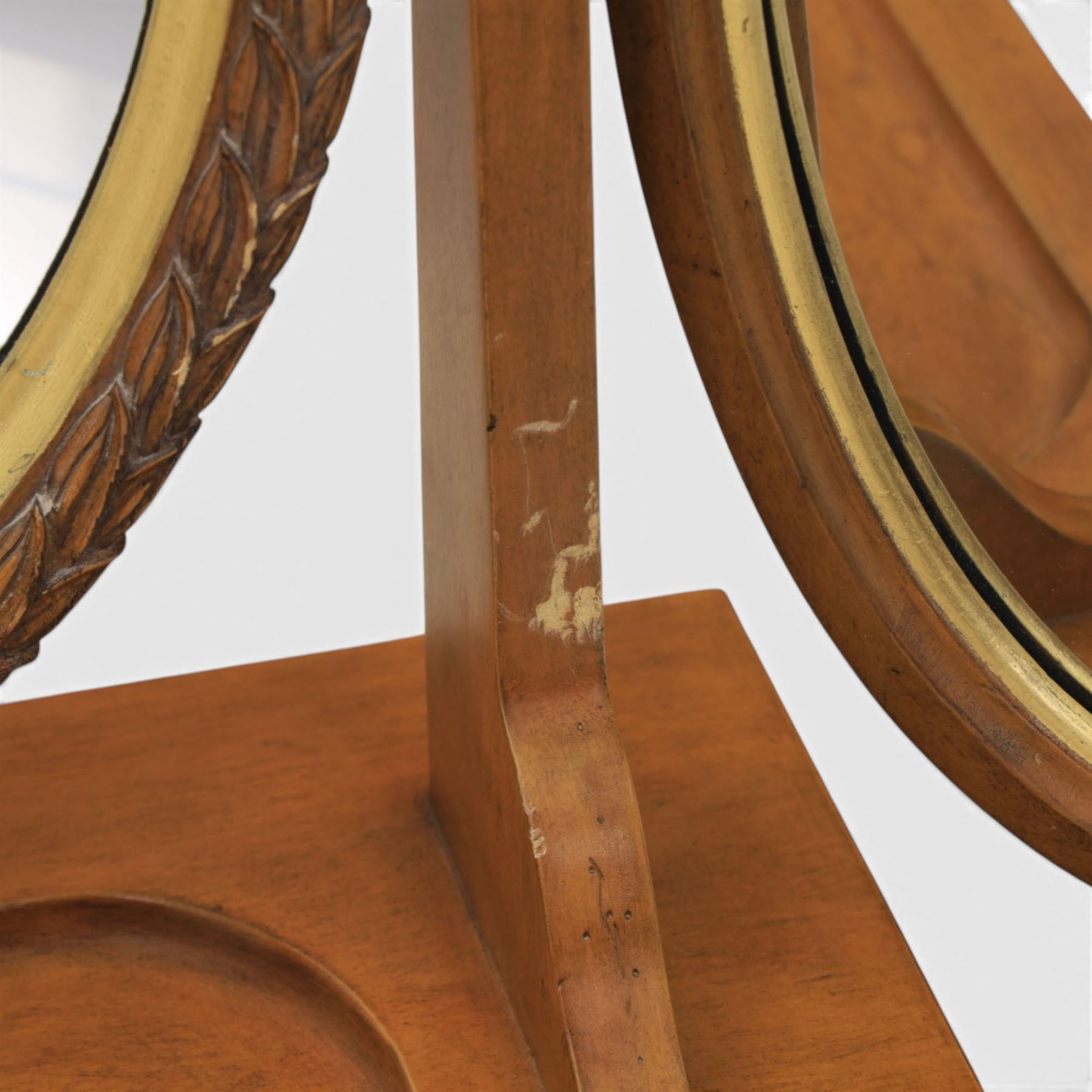 And So To Bed - 'Louis XV' triple dressing table mirror, central circular bevelled mirror, enclosed by parcel gilt with carved edge, flanked by two oval mirrors, the base with a well for trinkets 
