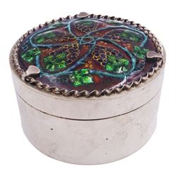 Modern silver box, of circular form, the cover mounted with an an Arts & Crafts enamel panel of a fruiting vine by H G Murphy, circa 1920, hallmarked Jon Braganza, London 2018, H4.5cm D8cm


 
